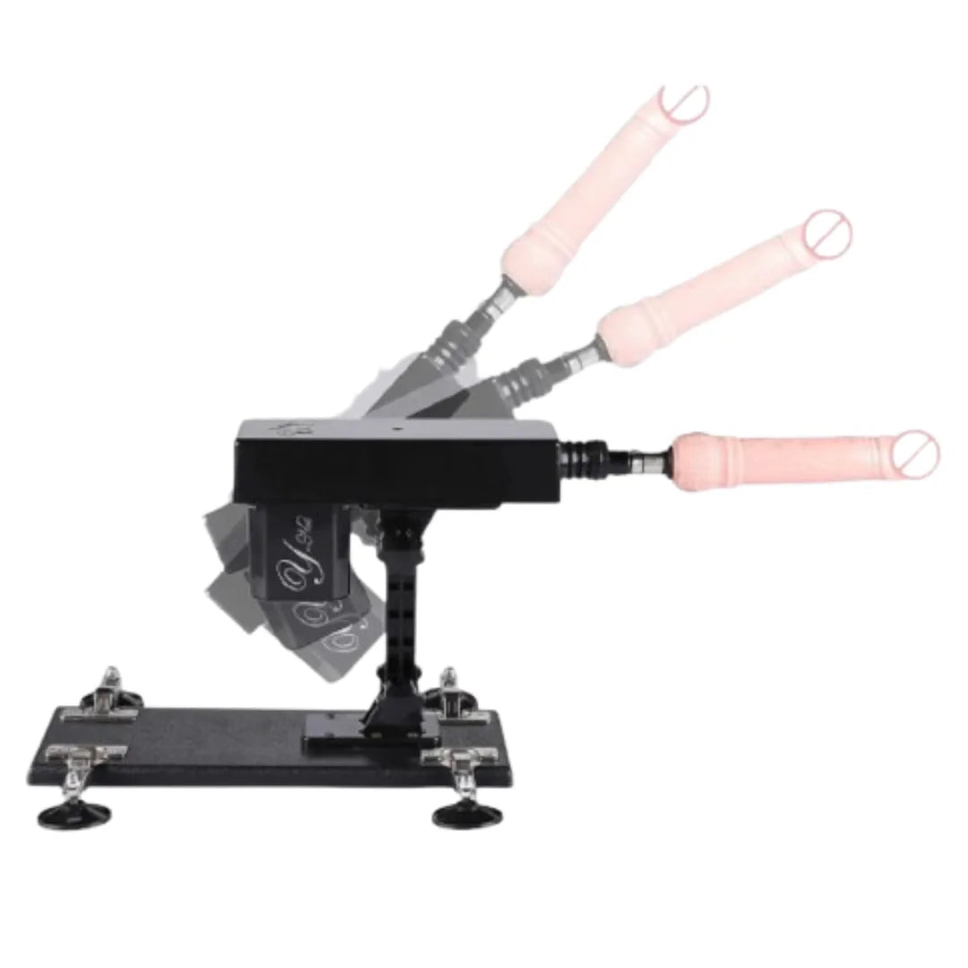 Black metal tool with pink dildo on a white background