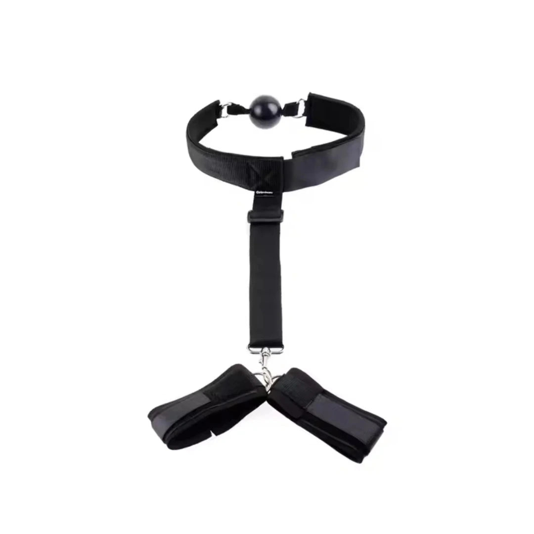 Black restraint device with attached hand straps on a white background
