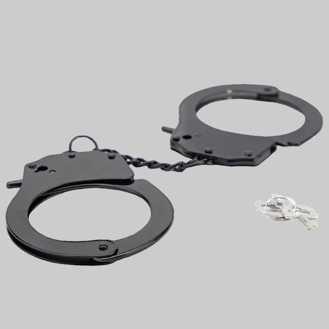 Black handcuffs on a gray background