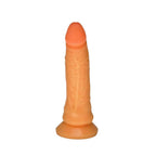 Orange silicone dildo on a white background