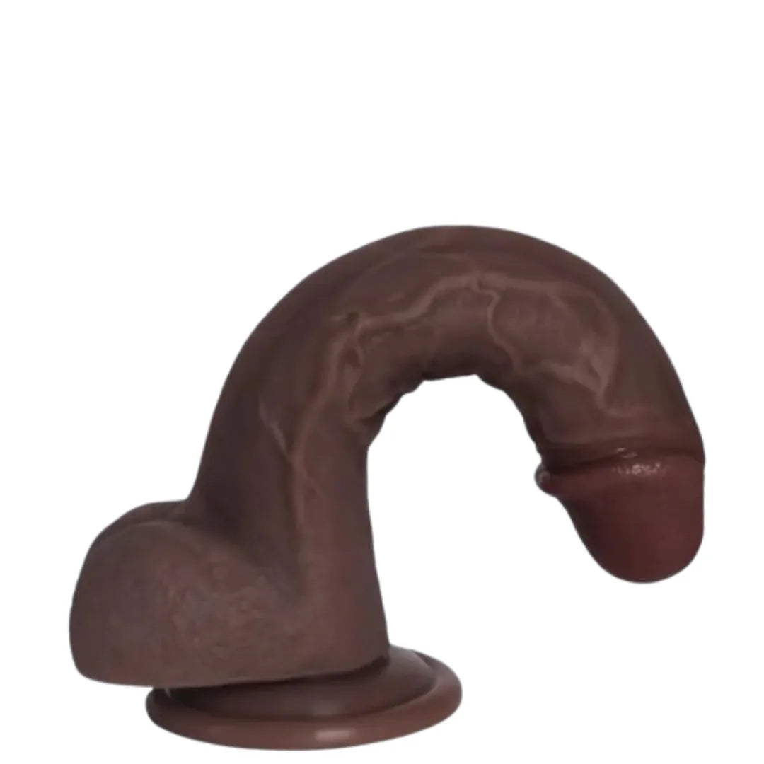 Black dildo on a white background