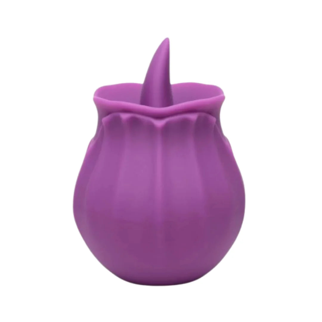 Purple silicone product with a pointed top on a white background