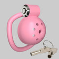 Pink ball with a handle and keychain on a white background