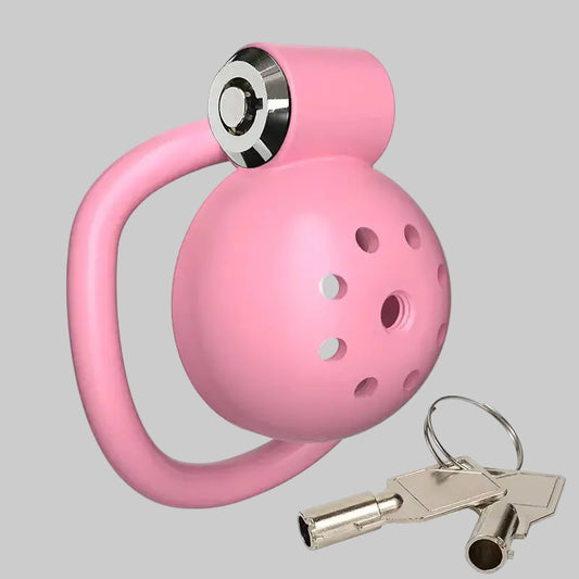 Pink ball with a handle and keychain on a white background