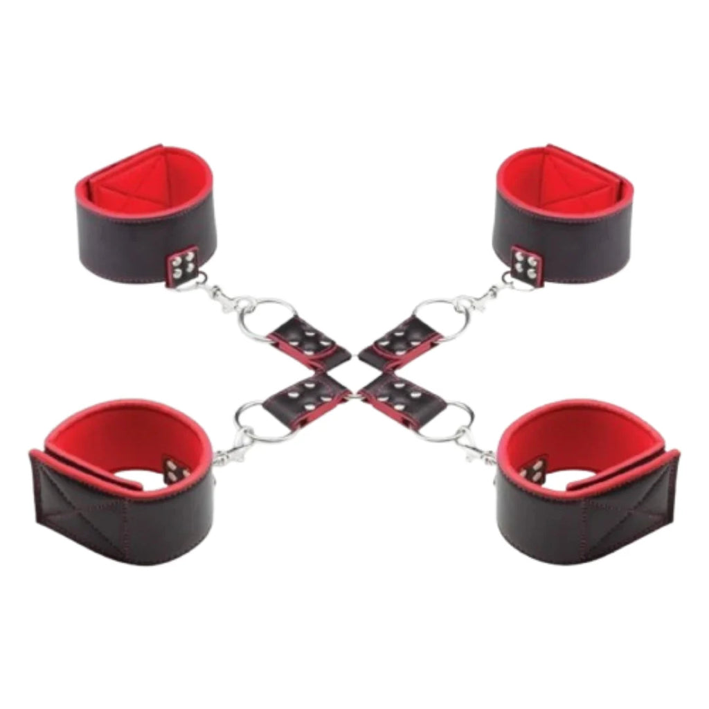 Black and red leather cuffs with a central chain on a white background