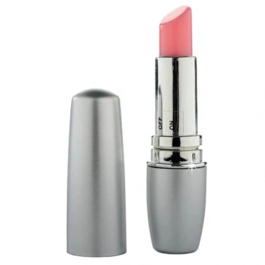 Pink lipstick with silver case on a white background