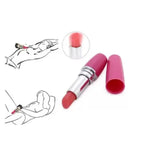 Pink lipstick vibrator with open cap on a white background