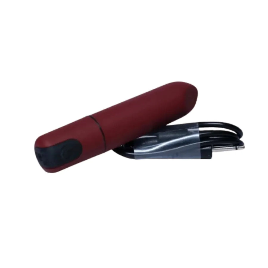 Red and black mini vibrator on a white background