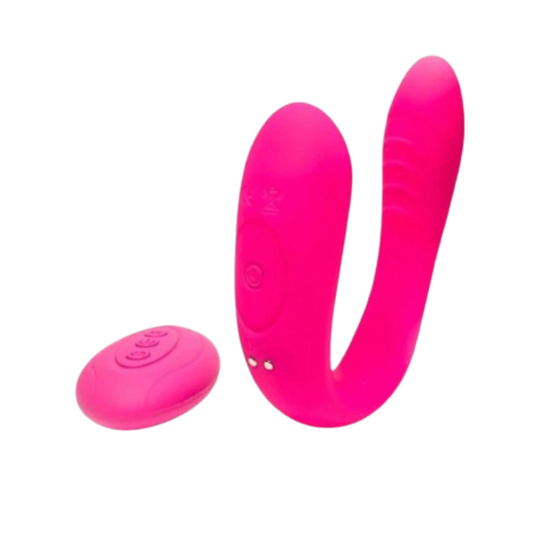 Pink silicone Vibrator with remote control on a white background