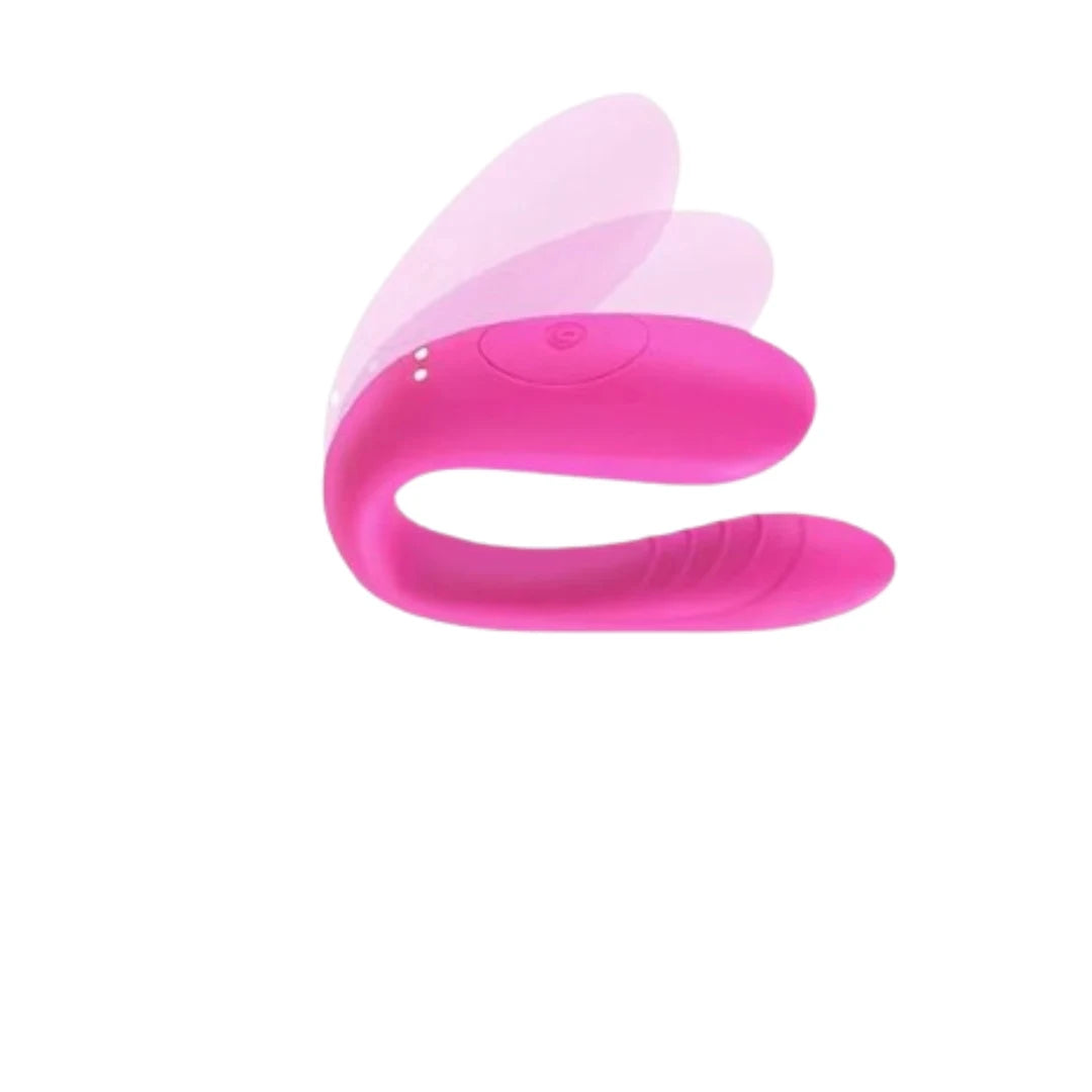 Pink and clear silicone Vibrator on a white background