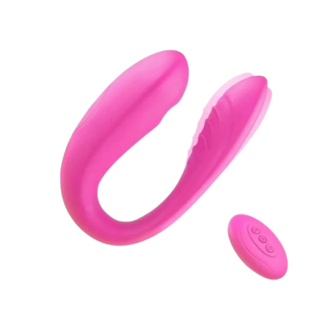 Pink silicone Vibrator with remote control on a white background
