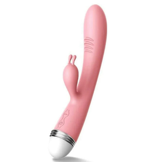 Pink and white women vibrator on a white background