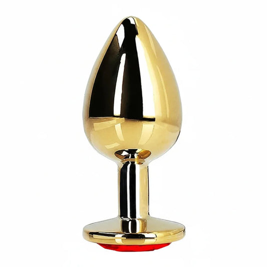 Gold egg-shaped anal plug with a red base on a white background