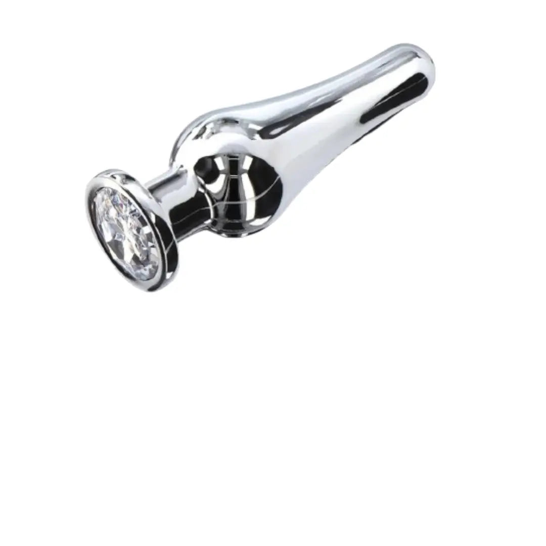 Metal anal plug on a white background