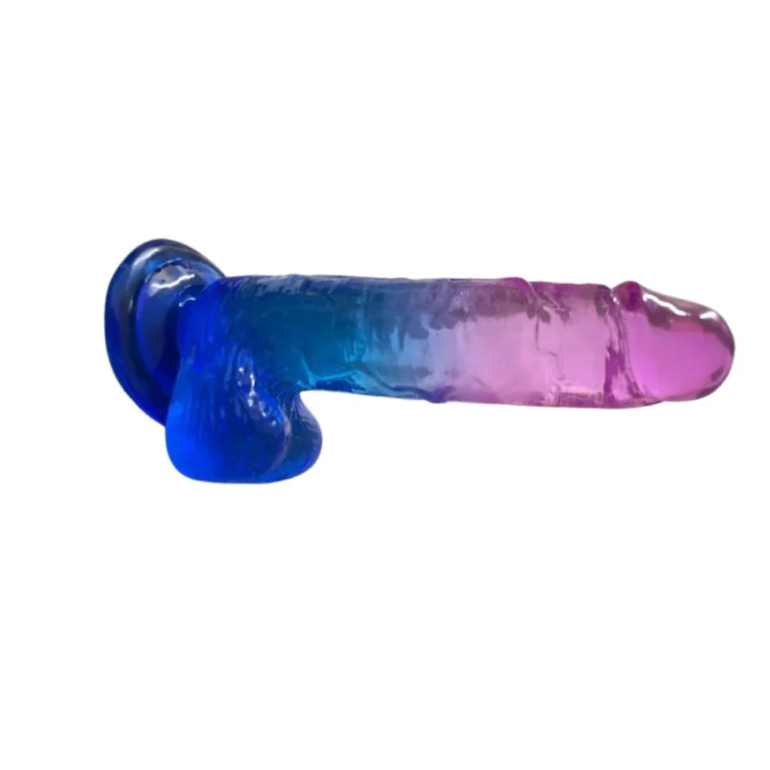 Gradient blue to pink glass dildo on a white background
