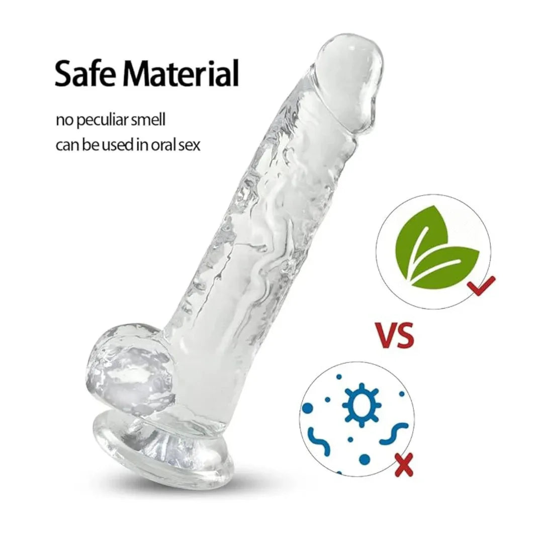 Clear Silicone dildo with text about safe material and no peculiar smell on a white background